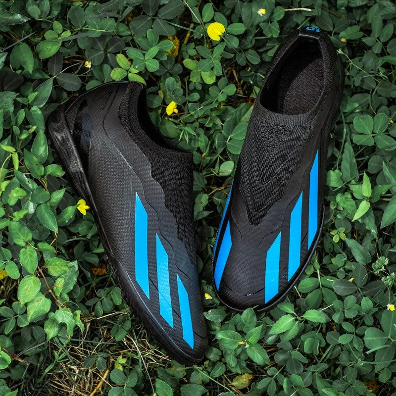 Sapatos de futebol de cano baixo unissex treinamento competição jogo sem costu